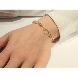 Photo of worn Chain Bracelet with circles 5 small and 1 big  18kts yellow gold 19cm