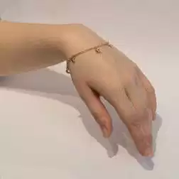 Bracciale 7 ciondoli 4 Lune 2 Stelle 1 Cuore in Tre Colori foto indossata