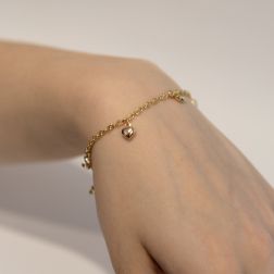 Bracciale 7 ciondoli 4 Lune 2 Stelle 1 Cuore in Tre Colori foto indossata