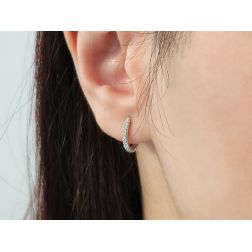 Photo of worn Small Oval Hoops with Diamonds