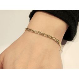Bracciale maglia tigre sfaccettata oro giallo x 3.6mm foto indossata