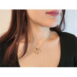 Photo of worn Rose Gold Butterfly Necklace 3 stones Ruby Sapphire and Emerald