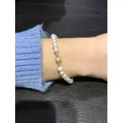photo of worn Pearls Bracelet with yellow gold sandblasted sphere