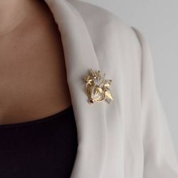 Photo of worn Vase Brooch with Ruby and Diamonds in Yellow and White Gold