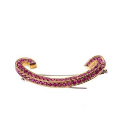 C-shaped Brooch with 69 Rubies in Yellow gold