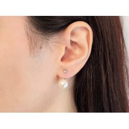 Photo of worn Pearl and Light Point Diamond Earrings