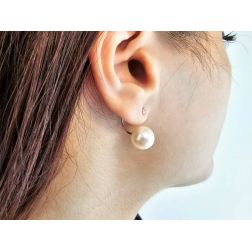 Photo of worn Pearl and Light Point Diamond Earrings