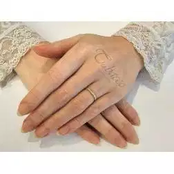Fedina Gardenia Oro Giallo UNOAERRE foto indossata