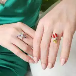 Photo of worn Purple and Blue Dragonfly Ring with Diamonds and Yellow Sapphire