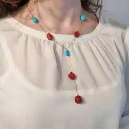 photo of worn Y Necklace in Yellow Gold and Red Coral and Turquoise