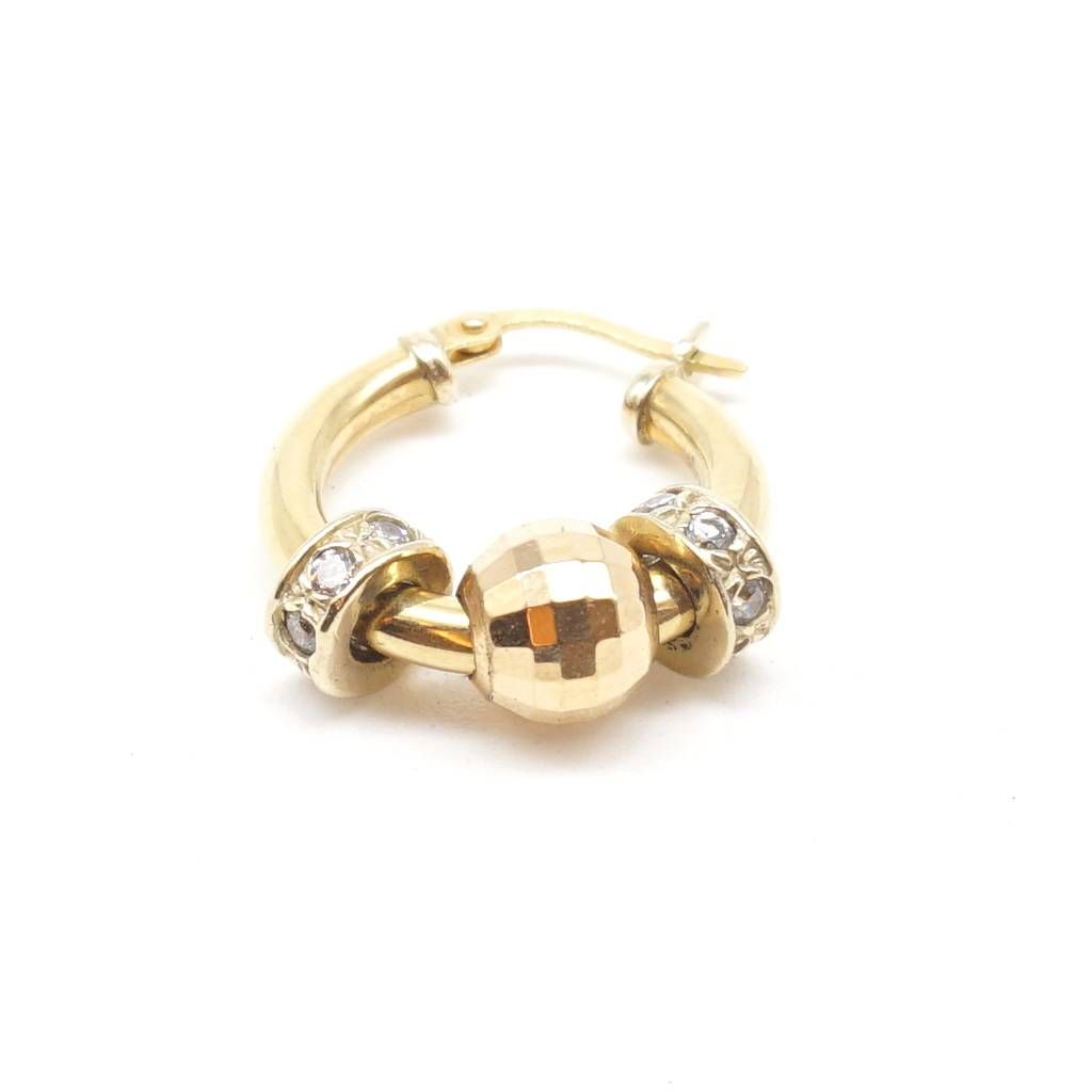 Bushings with 18 kt yellow gold and cubic zirconia charms