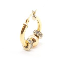 Bushings with 18 kt yellow gold and cubic zirconia charms