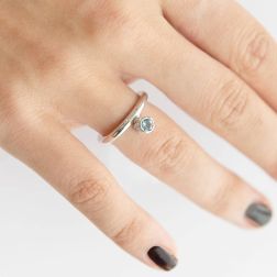 Photo of worn Solitaire Design Ring with Aquamarine and Diamonds