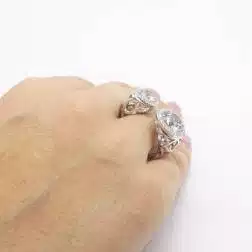Photo of worn Open Design Ring with Acquemarines and Diamonds Photo of worn Open Design Ring with Acquemarines and Diamonds