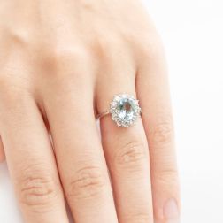 Kate White Gold Ring with Aquamarine 9x7mm and 12 Diamonds photo of worn