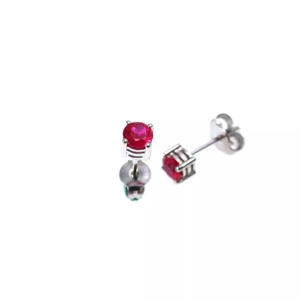 Solitaire Earring with 0,730ct Rubies Bezel with 3 circles