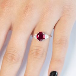 Solitaire Ring with 9x8 Ruby and 6 Diamonds worn photo