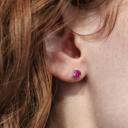 Solitaire Earrings with 0,775ct Rubies Bezel with 3 circles photo worn