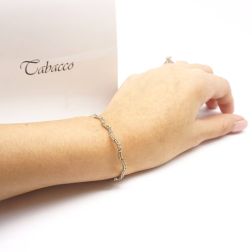 Photo of worn Yellow Waves Tennis Bracelet