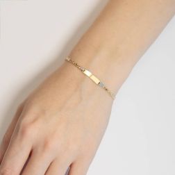 Bracciale con Targa Grumetta e Traversino Oro Giallo e Bianco foto indossata