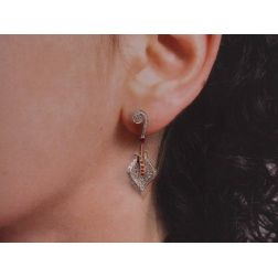 Photo of worn Rose and White with Diamonds and Rubies Gold Lily earrings
