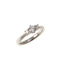 Trilogy platinum ring with central diamond GIA 0.30 ct.