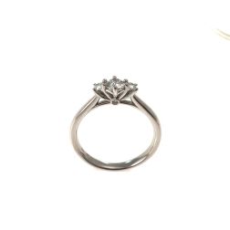 Trilogy platinum ring with central diamond GIA 0.30 ct.