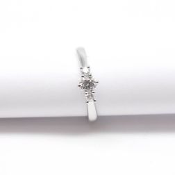 Trilogy platinum ring with central diamond GIA 0.30 ct.