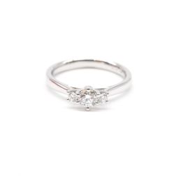 Trilogy platinum ring with central diamond GIA 0.30 ct.