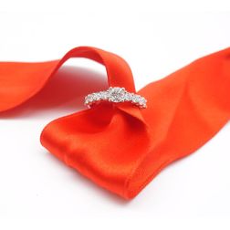 Platinum solitaire ring with diamonds on the shank and central GIA diamond 0.61 ct.