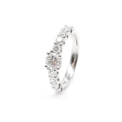 Platinum solitaire ring with diamonds on the shank and central GIA diamond 0.61 ct.