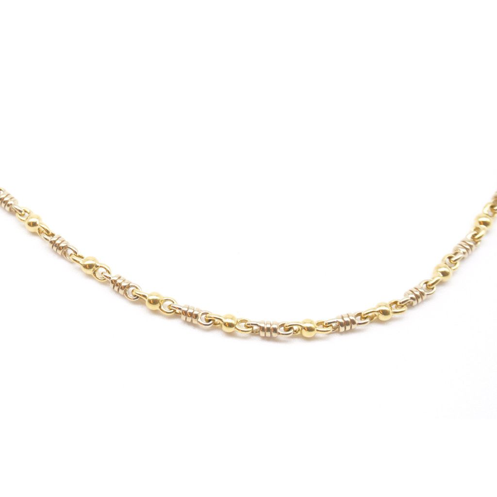 Collana 62cm alternata molla in oro bianco pallina in oro giallo