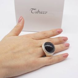 Photo of worn Ring White and Black Dome with Diamonds