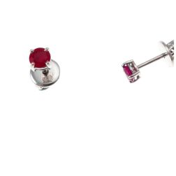 Solitaire earring in white gold with rubies
