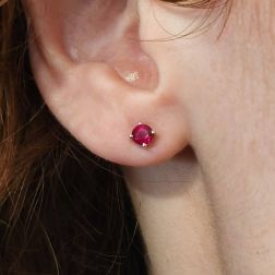 photo of worn Solitaire earring in White Gold with Rubies