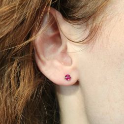 photo of worn Solitaire earring in White Gold with Rubies