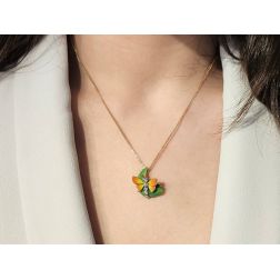 Photo of worn  Orange 18kt white gold Butterfly on Bronze leaf Pendant