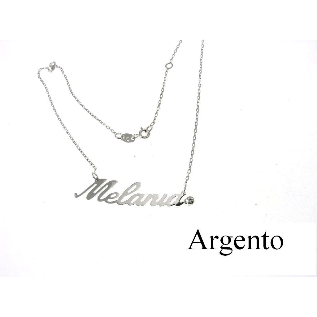 Silver necklace with name MELANIA and zircon at the end. Last Piece available
