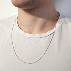 Photo of worn Long white gold spiral necklace