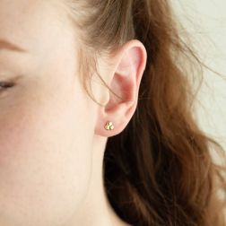 photo of worn 3 ball earrings in yellow gold