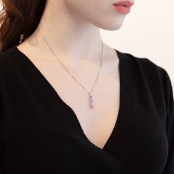 photo of worn Trilogy Pink Sapphires and Diamonds Pendant