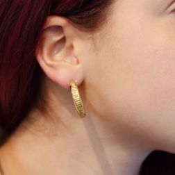 photo of worn Yellow Gold 2.70cm x 5.55mm Round Hoops with horizontal Grooves