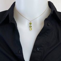 Trilogy Round Peridot and Diamond Necklace photo of worn