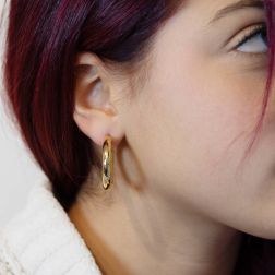 photo of worn 3,0cm x 4,8mm Shiny Tubular Hoops in yellow gold