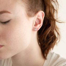 photo of worn Butterfly-shaped earrings in 18k white gold