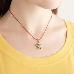 photo of worn Eno the Alien Little Head Pendant White Gold