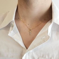 photo of worn Jesus Crucified pendant in 18kt Yellow and White Gold