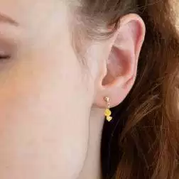 Photo of worn Enamelled Baby Duck Earrings
