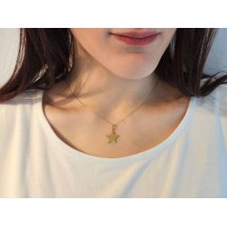 Photo of worn Flat Star Pendant in Yellow Gold 0.5mm Thickness