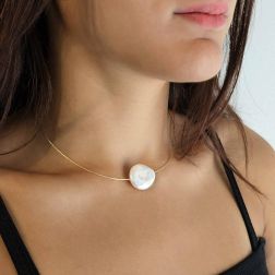 Photo of worn Semi-rigid Necklace with Pearl in Yellow Gold